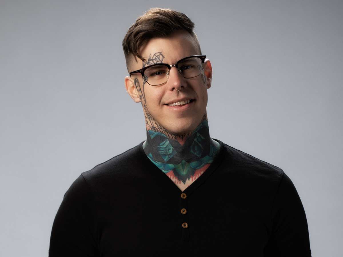 Picture of man with a lot of tattoos
